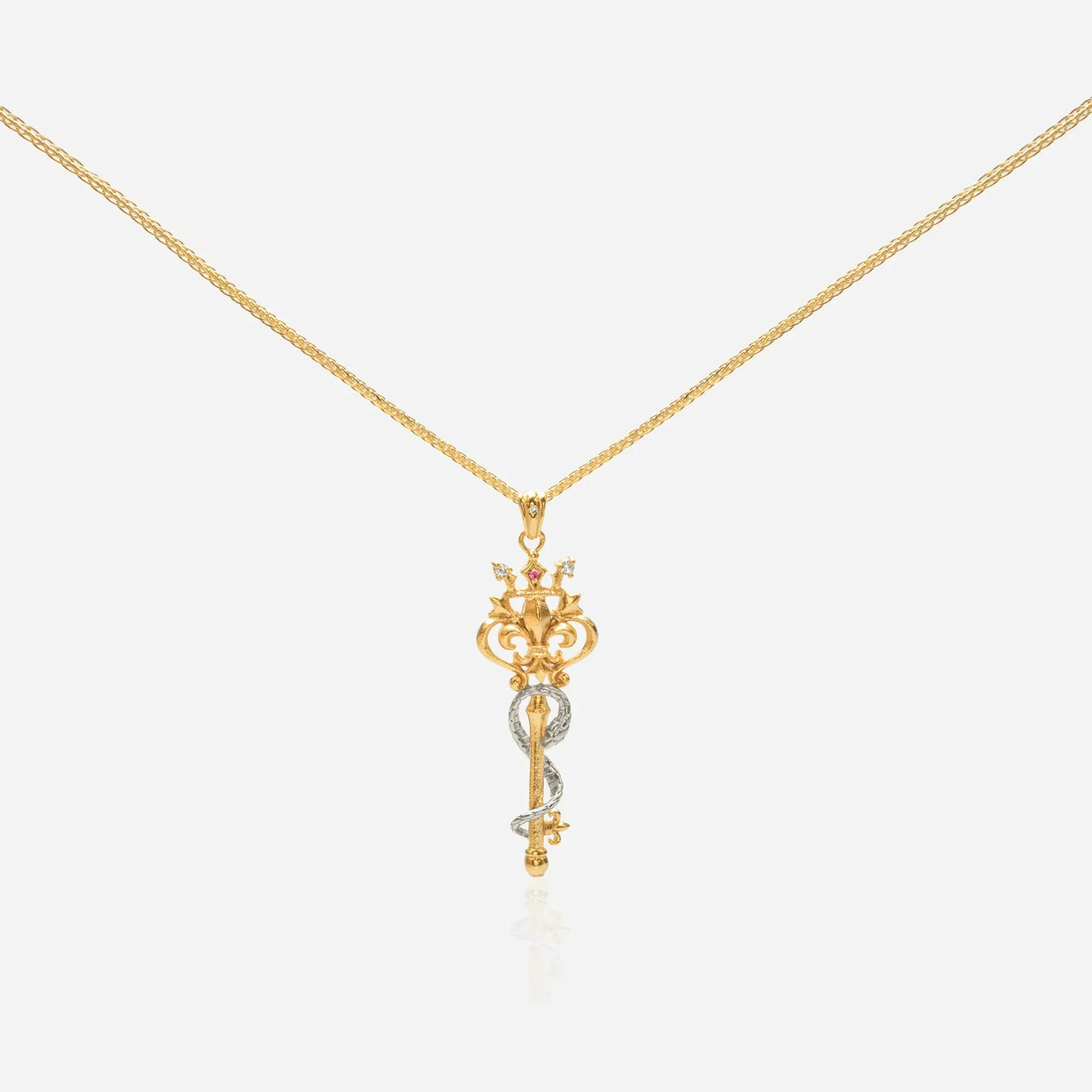 Arcana key necklace with serpent caduceus and fleur-de-lis two-tone silver gold pink lab diamond talisman occult