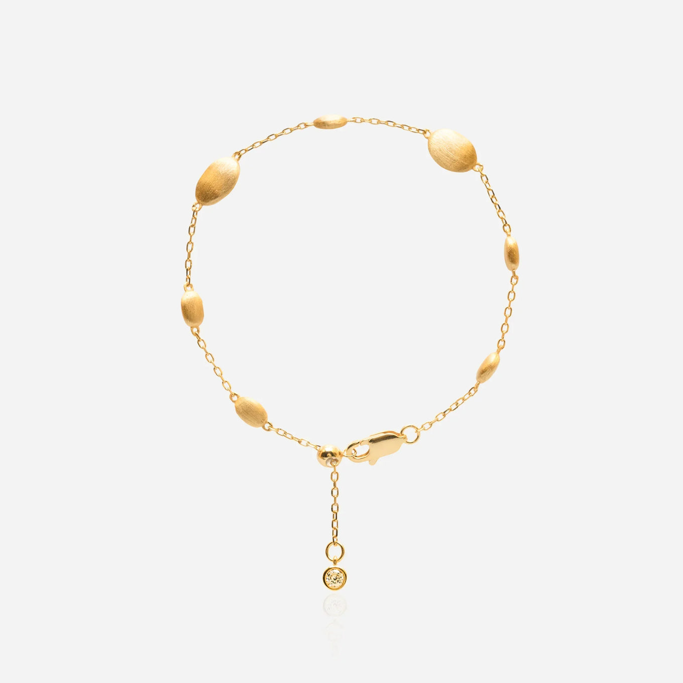 Dainty everyday gold chain bracelet with satin-finished graduated oval cocoon beads minimalist adjustable slider jewelry
