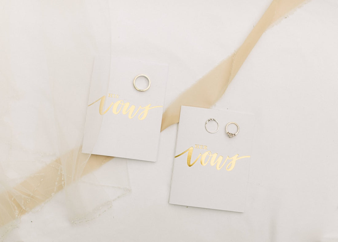 Minimalist earrings on white sheet representing office-appropriate jewelry and quiet luxury trends