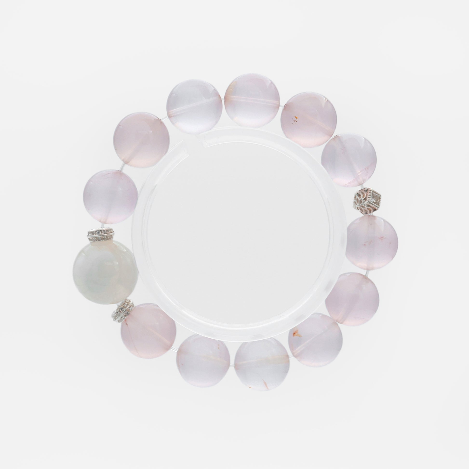 Full view of ÉLARAMUSE star rose quartz bracelet showing the 14-15cm petite fit and natural phantom crystal inclusions
