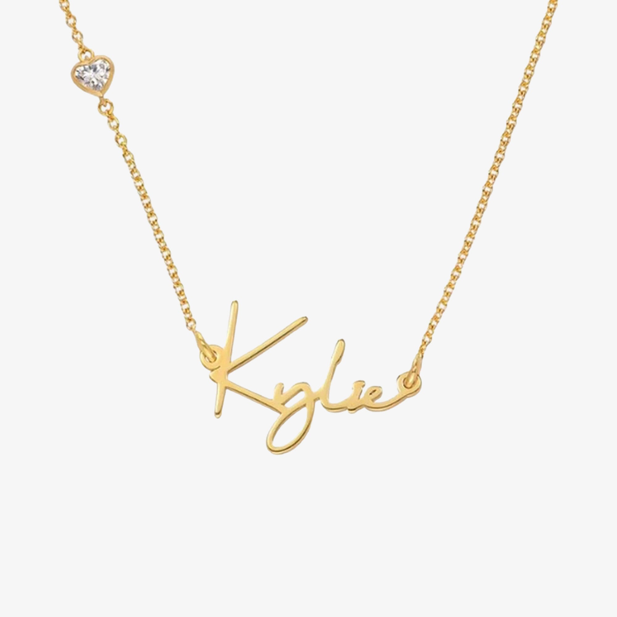 Gold handwritten name necklace with heart cubic zirconia accent on fine rolo chain — custom cursive pendant jewelry
