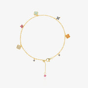 Multi-Color Clover Bracelet — six asymmetrical four-leaf clover charms in pastel pink, orange, sky blue, navy, and ice white stones set in 18K gold-plated O-link chain, flat lay