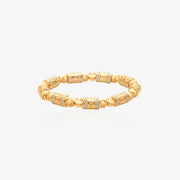 Gold beaded bracelet with alternating carved six-syllable mantra prayer wheel barrel beads and matte gold spacer spheres, diamond pave rings at both ends of each prayer wheel, 18K gold plated, elastic cord, worn on unisex wrist