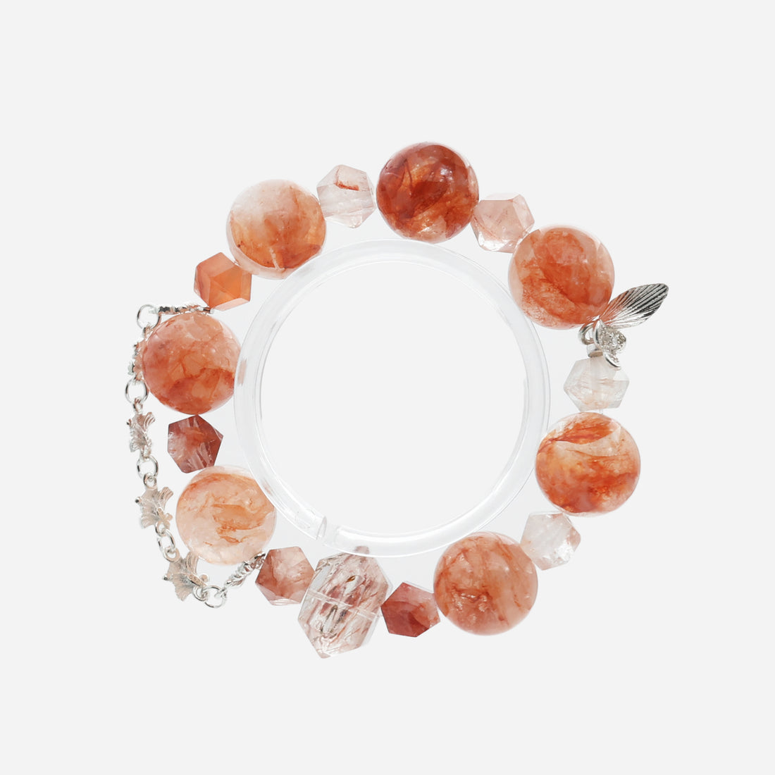 Top-down view of the Hematoid Quartz bracelet, showing the geometric Fire Quartz cubes and Red Rutilated pillar.
