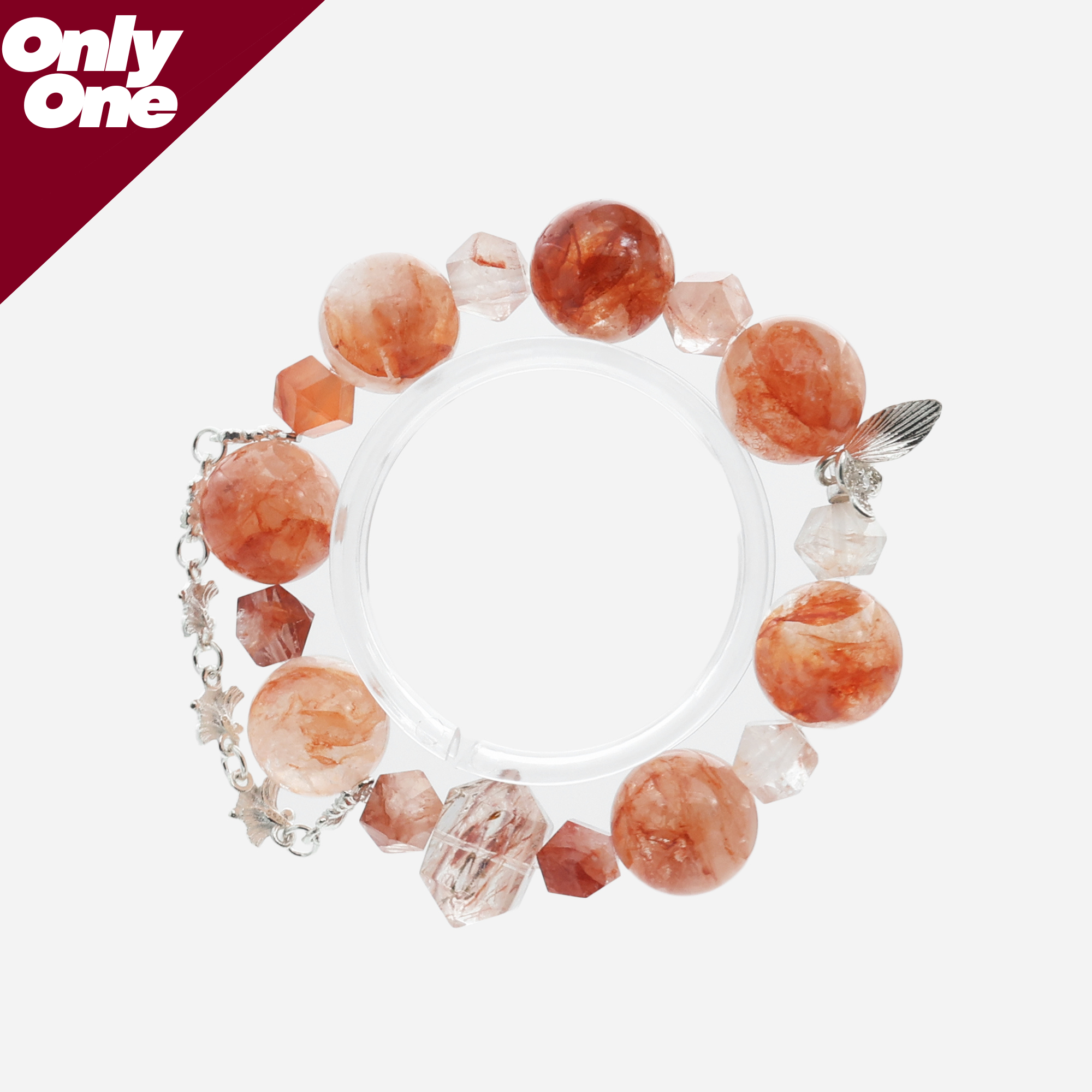 Top-down view of the Hematoid Quartz bracelet, showing the geometric Fire Quartz cubes and Red Rutilated pillar.