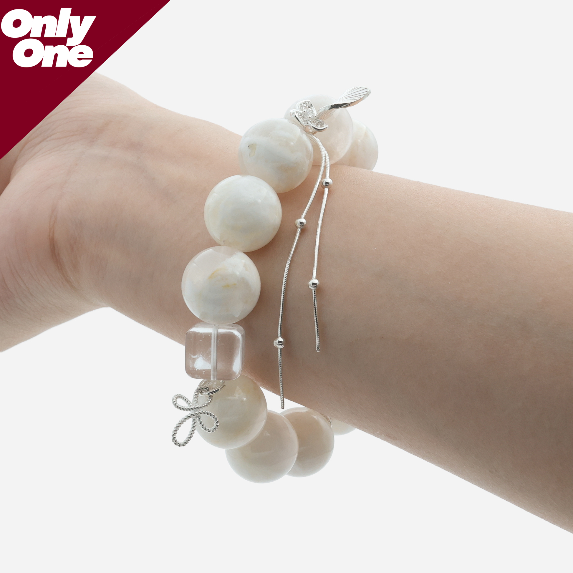 Natural white quartz bracelet with 15mm snow ghost phantom beads and fluid 925 sterling silver tassel on wrist
