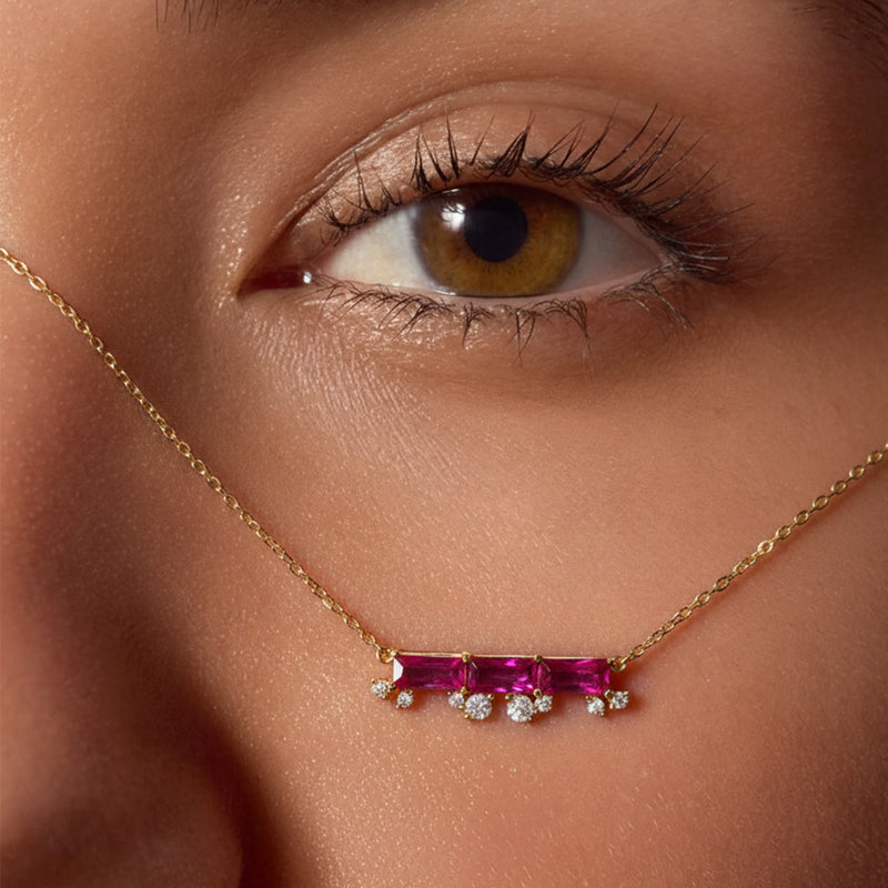 Ruby bar necklace worn showing balance bar design with lab ruby and diamond accents 18k gold plated silver dainty jewelry