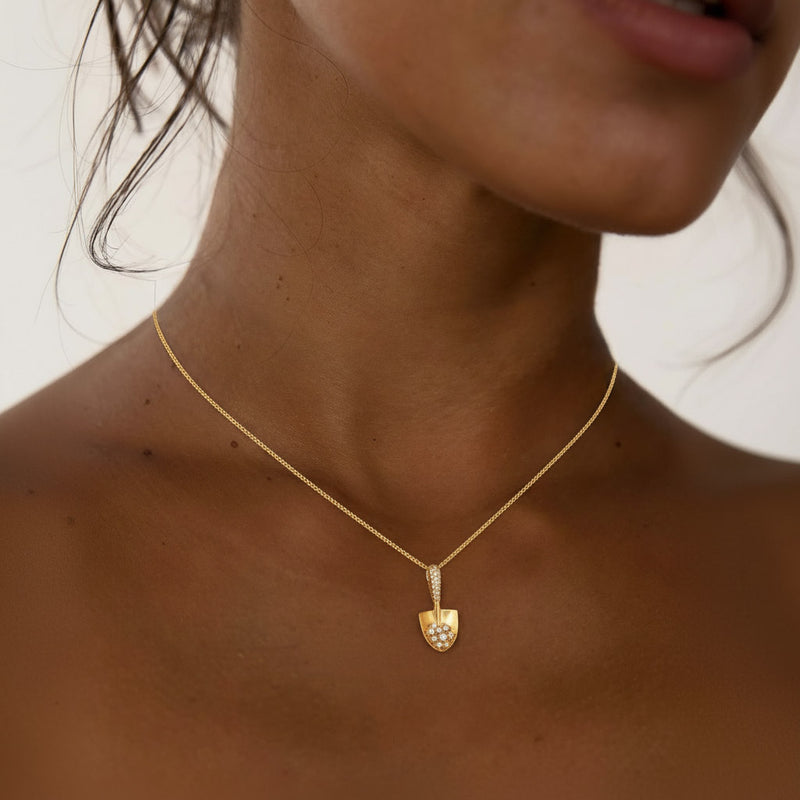 Gold spade necklace shovel pendant with diamond treasure pile gardening jewelry entrepreneur gift