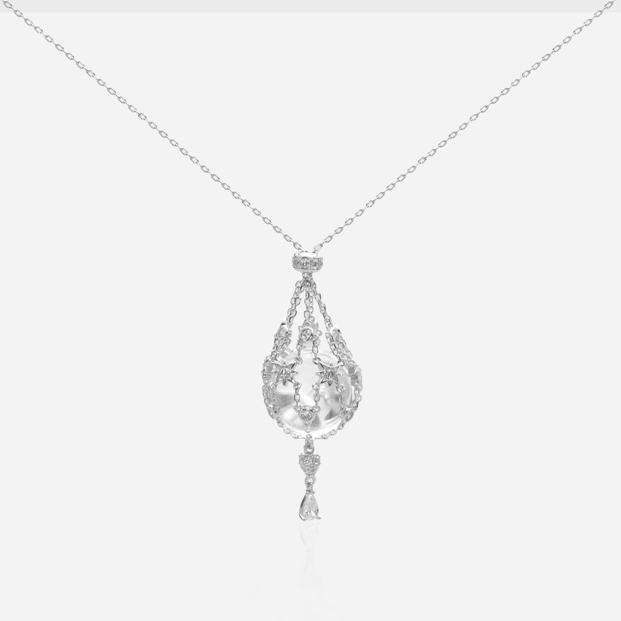 Stellar Pavilion necklace featuring a detachable 925 silver latticework cage pendant with a natural rock crystal sphere.