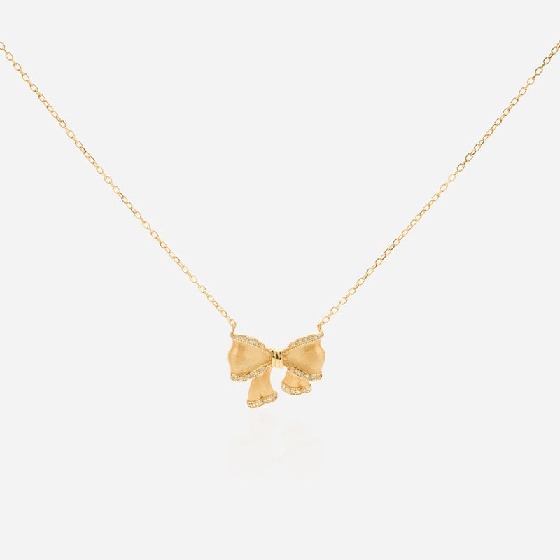 Ribbon bow necklace with brushed satin finish and micro-pave diamonds vintage gold 3D bow design dainty jewelry French romantic aesthetic