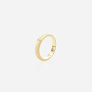 The Oasis Ring — a slim textured gold band with a single flush-set lab diamond on a sterling silver base by ÉLARAMUSE