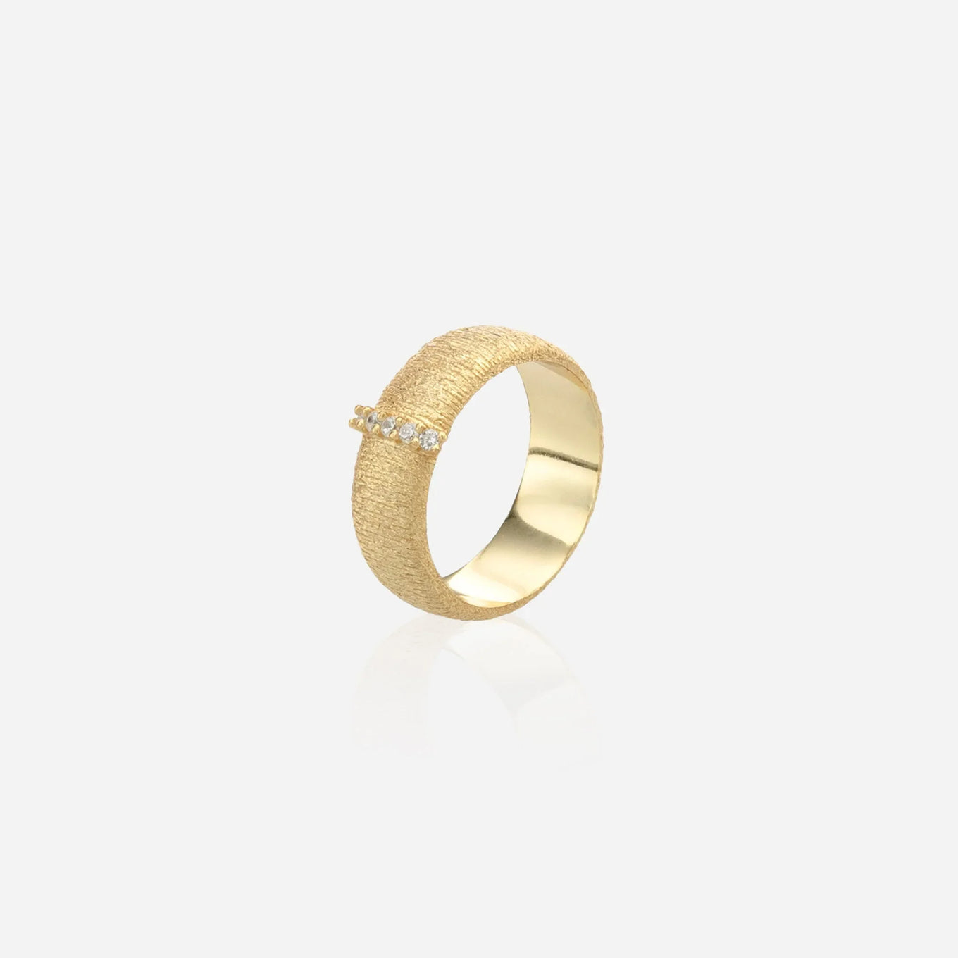 The Oasis Wide Band — a wide textured gold ring with a horizontal channel of lab diamonds by ÉLARAMUSE