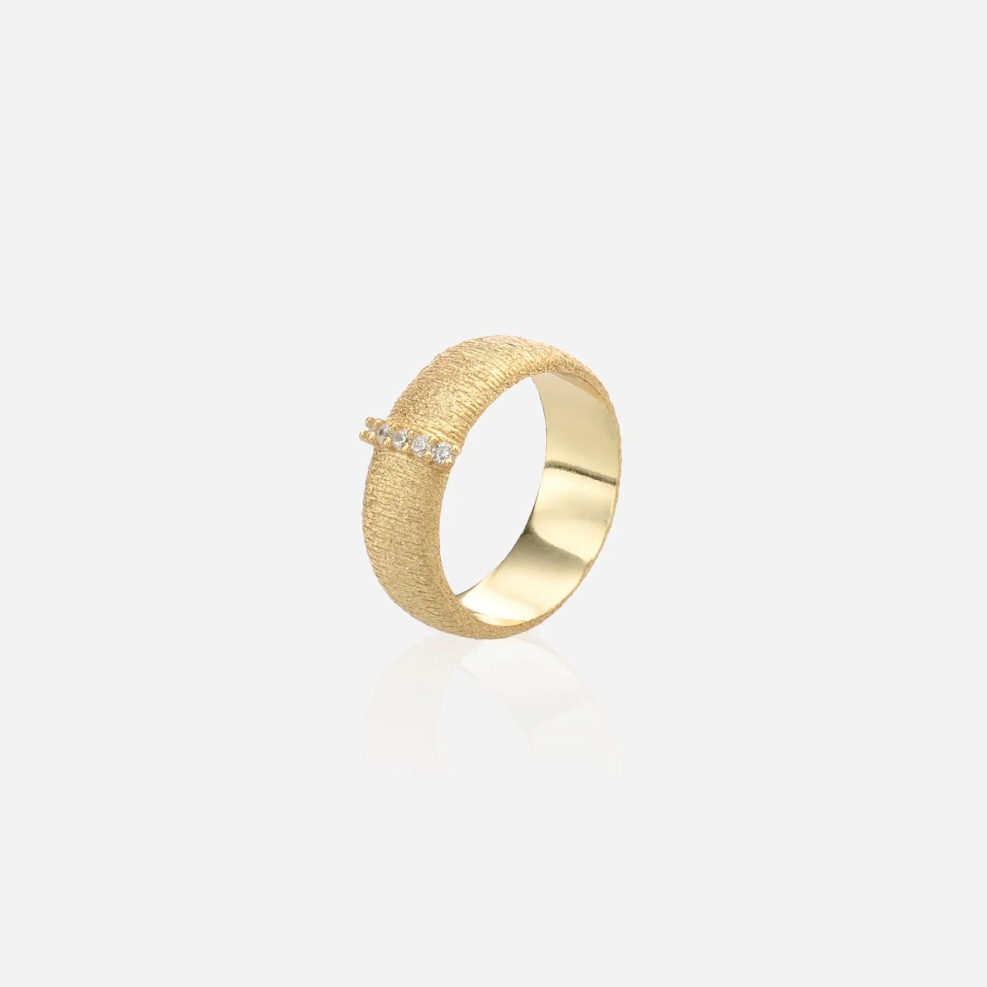 The Oasis Wide Band — a wide textured gold ring with a horizontal channel of lab diamonds by ÉLARAMUSE